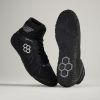 A pair of high-top black training shoes featuring a unique design with hexagonal patterns on the outsole optimal for performance and agility