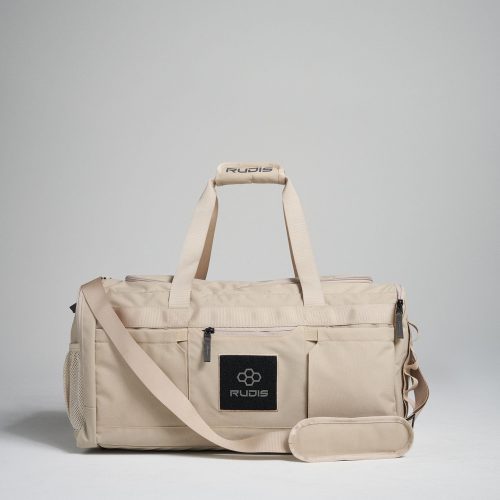 This image features a stylish beige duffel bag designed for versatility showcasing its sleek exterior and brand logo for practical use in various settings