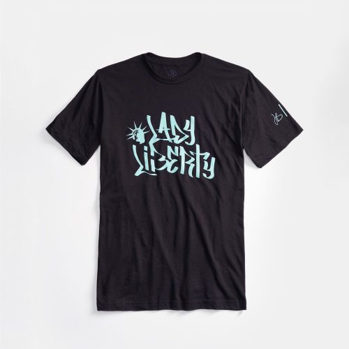 A black t-shirt featuring stylized text that reads Lady Liberty alongside an illustration of the Statue of Liberty