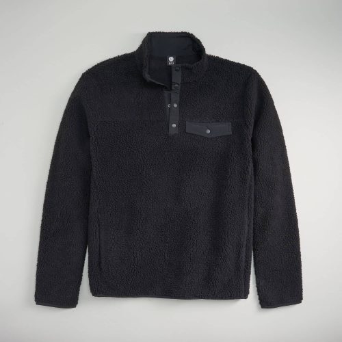 A soft black fleece pullover featuring a high collar contrasting snap buttons and a chest pocket with a flap