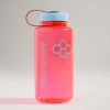 A vibrant pink water bottle with a light blue cap featuring the words A WAY OF LIFE and a honeycomb design