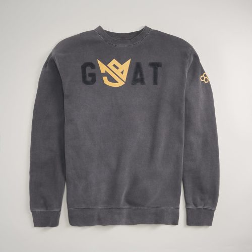 A stylish gray sweatshirt prominently featuring the word GOAT in bold black letters and a distinct golden emblem design