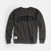 A dark green sweatshirt featuring the bold word LIBERTY prominently displayed across the front complemented by a small logo on the bottom left corner