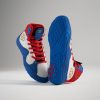 These high-top athletic shoes feature a vibrant red white and blue design with unique detailing and a textured sole for superior grip