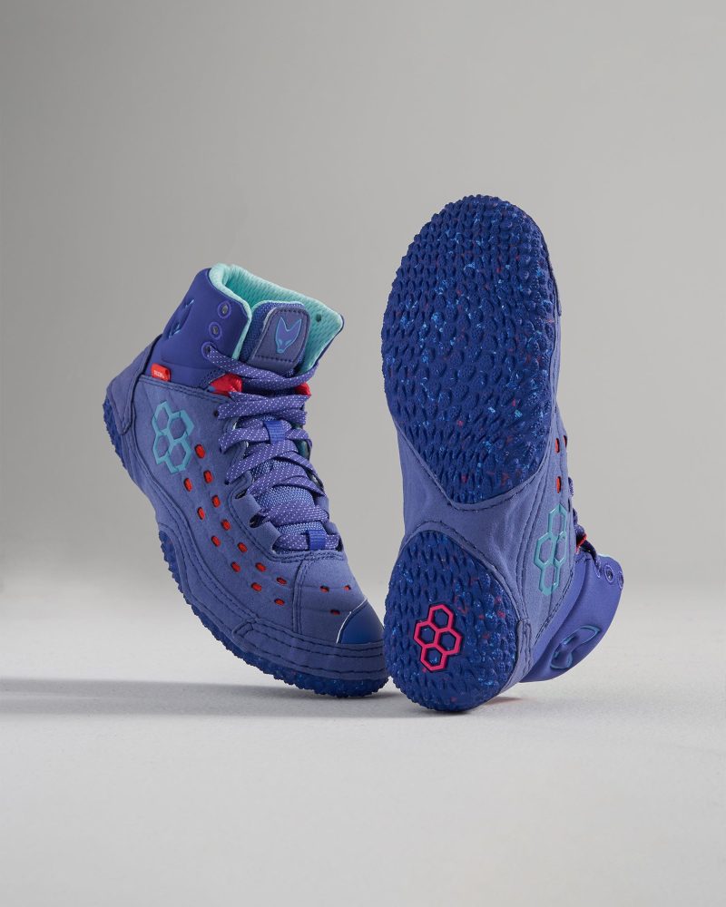 A pair of brightly colored blue athletic shoes with red accents and a textured sole designed for performance and style